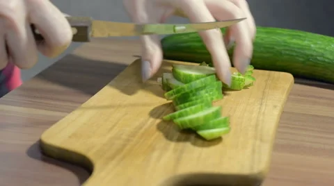 Cutting a cucumber Stock Footage 56140274