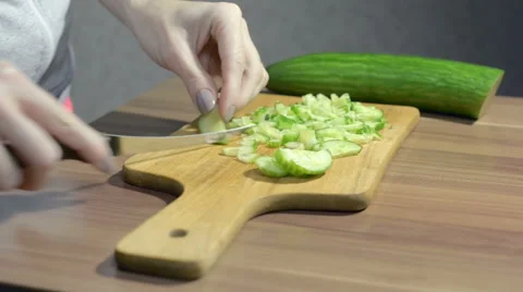 Cutting a cucumber Stock Footage 56140363