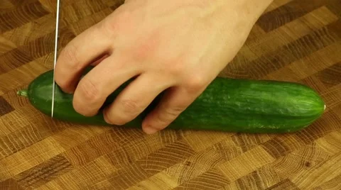 Cutting cucumber Stock Footage 58493664