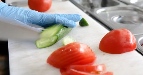 Cutting a cucumber Stock Footage 111896563