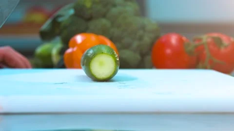Cutting a cucumber Stock-Footage 134471540