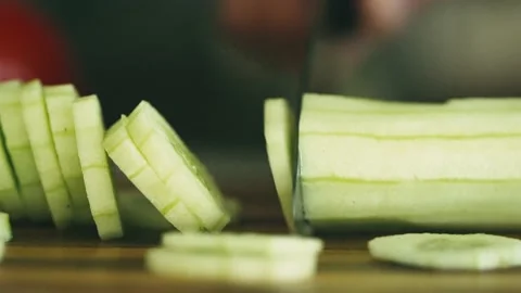 Cutting cucumber Stock Footage 136571476