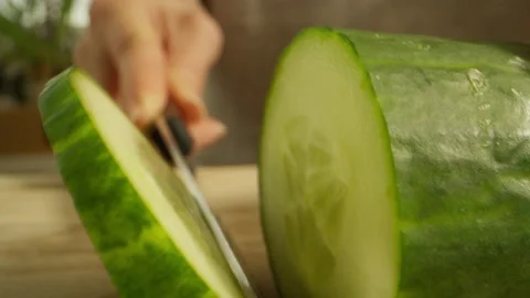Cutting cucumber Stock Footage 138747776