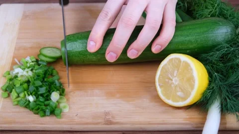 Cutting cucumber Stock Footage 233263191