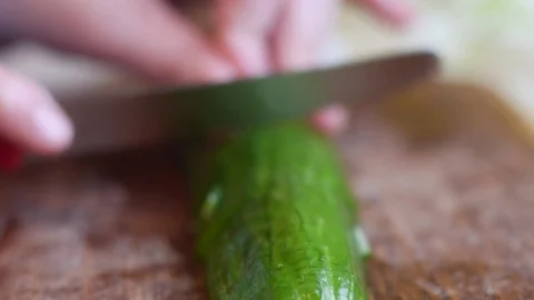 Cutting cucumber sharp Stock Footage 73120024
