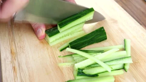 Cutting Cucumber Into Strips 스톡 동영상 136736929