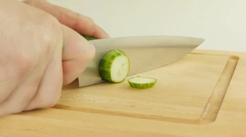Cutting cucumbers Stock Footage 22418399