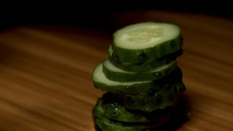  Cutting cucumbers into small pieces. Stock Footage 104657337