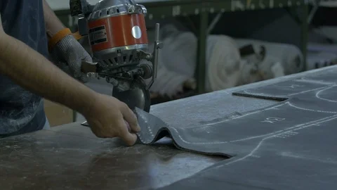 Cutting Curved Pattern in Fabric Stock Footage 100852103