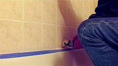 Cutting Damaged Tile in Half Stock Footage 83841283