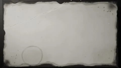 Cutting dark frame showing scalloped film centered, with ring mark, dust, Stock Footage 340268253