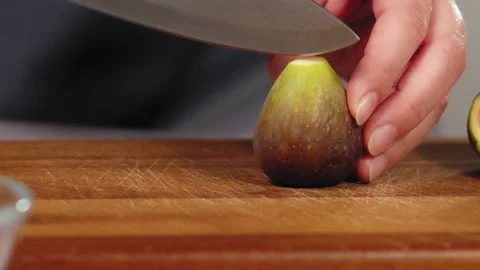 Cutting date in half on board Stock Footage 165793007