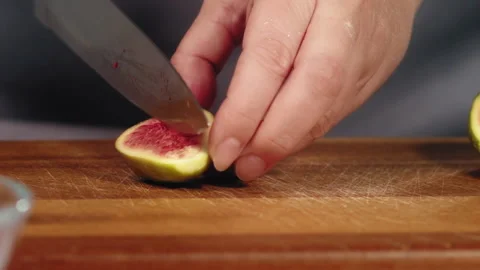 Cutting date in quarter on board Video stock 165973892