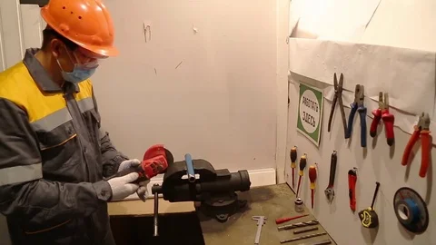 Cutting of a detail by the electrotool Stock Footage 84814399