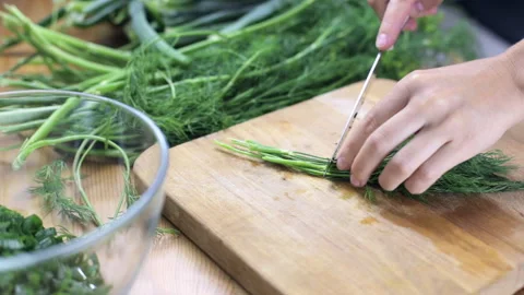 Cutting dill for salad Video stock 94474385