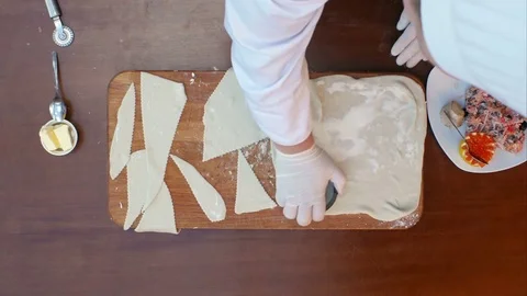 Cutting dough into circles Stock-Footage 74940848