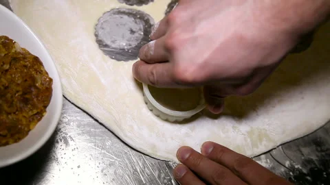 Cutting dough in different forms. Close-up Stock Footage 91007299