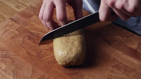 Cutting Dough In Half With Knife Close Up Stockbeeldmateriaal 333596607