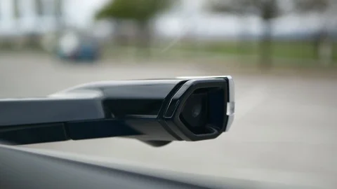 Cutting edge technology virtual side view mirror camera on modern electric car Stock Footage 122496363