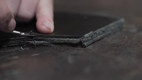 Cutting edges with leather patterns Stock Footage 129816967