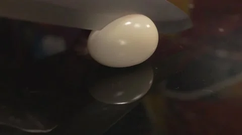 Cutting egg  in half Video stock 62640165