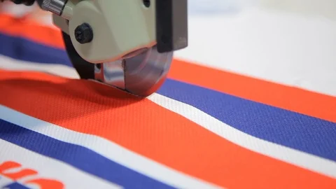 Cutting fabric machine. Textile factory. Sewing production line. Stock Footage 109339832
