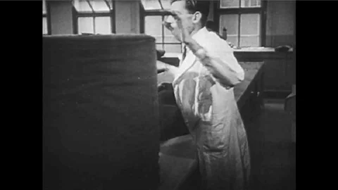 Cutting fabric from a pattern to make clothes Stock Footage 100615691