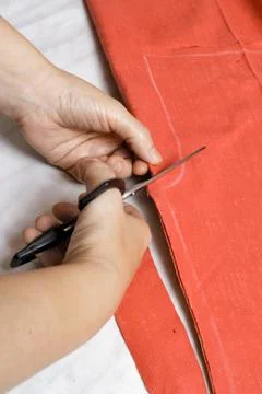 Cutting of fabric Stock Photos