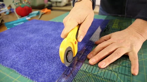 Cutting Fabric for a Quilting Project Stock Footage 45557607