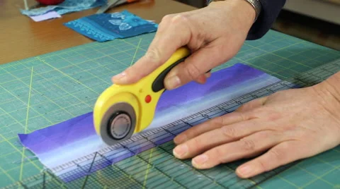 Cutting Fabric for a Quilting Project Stock Footage 45572635