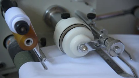 Cutting fabric to stripes Stock Footage 123912756