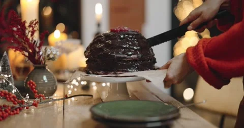 Cutting festive chocolate pie during a celebration Stock Footage 145983384