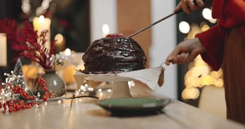 Cutting festive chocolate pie during a celebration Stock Footage 145983477