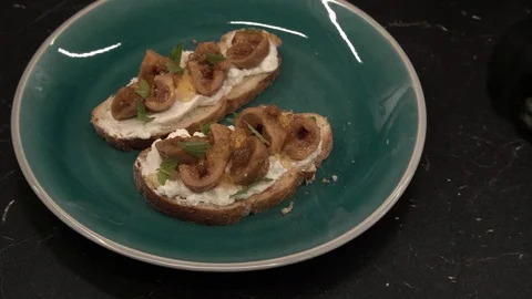 Cutting fig bruschetta above view Stock Footage 113528478