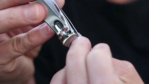 Cutting finger nails 25 fps Video stock 220351561