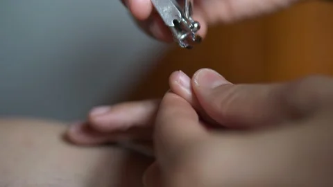 Cutting finger nails Stock Footage 166821077