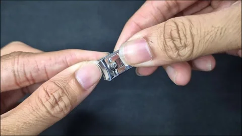 Cutting fingernails Stock Footage 292977576