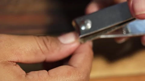 Cutting Fingernails Using Nail Clipper Close Up Stock Footage 329479295