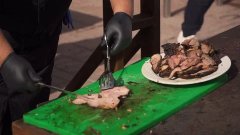 Cutting the finished meat Video stock 95766042