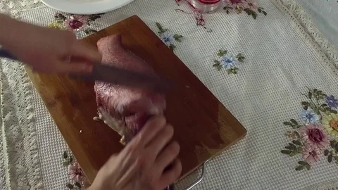 Cutting fish, cuts off the head 2. Stock Footage 77900863