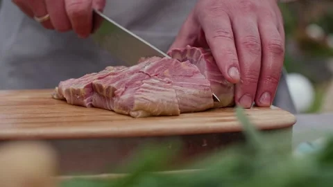 Cutting fish fillet with a knife Stock Footage 228353845