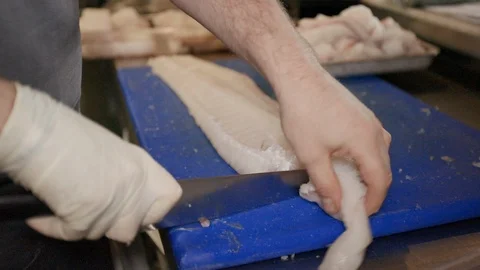 Cutting fish in a restaurant Stock-Footage 117993149