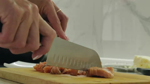 Cutting fish for sandwiches Stock Footage 199283136
