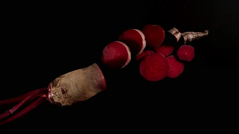 Cutting A Fresh Beetroot On A Black Table, Stop motion Stock Footage 147369687