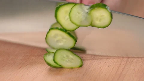 Cutting fresh cucumber Stock Footage 157421031