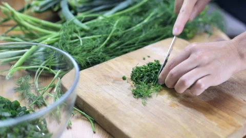 Cutting fresh dill Stock Footage 94474565