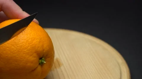 Cutting of fresh orange fruit. Stock Footage 85743224