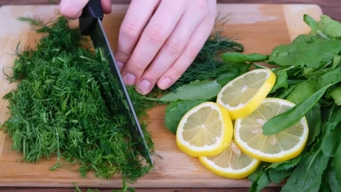 Cutting fresh parsley Stock Footage