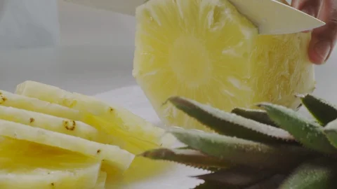 Cutting fresh pineapple Stock Footage 98298112