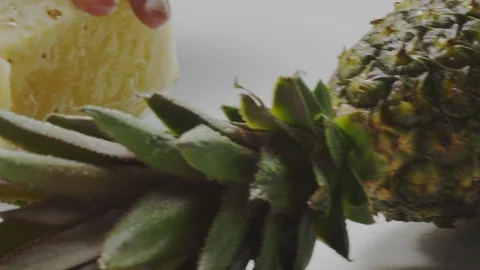 Cutting fresh pineapple Stock Footage 98298154